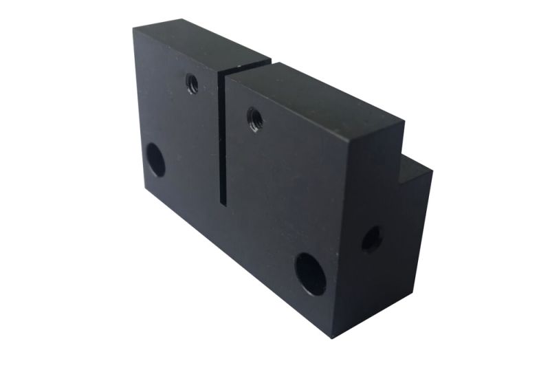 CNC bearbejdning sort oxid stopblok